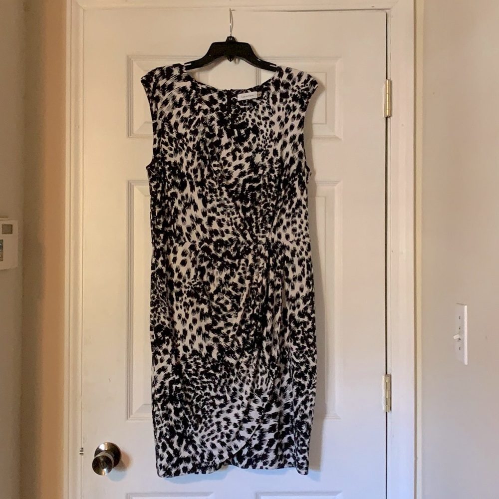 Calvin Klein sleeveless animal print dress size 12 with faux wrap skirt.